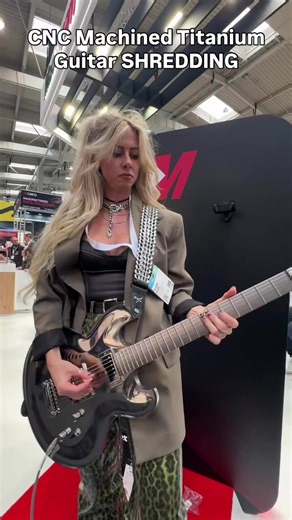This was one of the coolest demo pieces from the show - a TITANIUM guitar designed by Dean Zelinsky, and shredded on by Jennifer Leeknuth and Anthony Rizzo! This one was programmed in Mastercam - would you shred on this axe? #cncmachine #tools #shopowner #manufacturing #metalworking