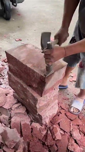 Cutting/shaping a stone block using a chisel and hammer #popular #construction #stone #block #work