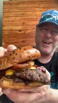 Flat Barbecue Cheeseburger with Onion Rings at Mangos Restaurant at the Larcomar Mall in Mina Flores