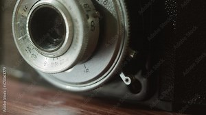 Old camera close-up. Antique photo equipment, macro shooting of vintage old-fashioned camera. Stock Video