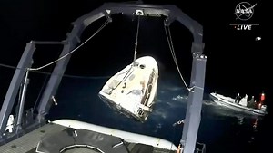 SpaceX returns four astronauts to Earth in a rare night splashdown