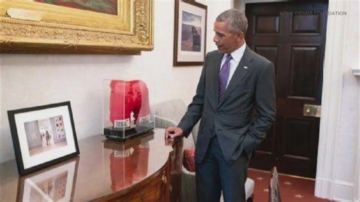 Obama donates Muhammad Ali’s gloves to presidential library