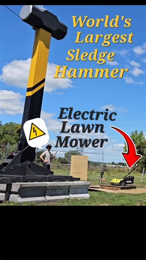 World's Largest Sledge Hammer vs Electric Lawn Mower