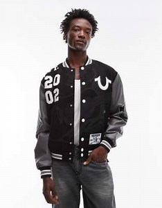 True Religion patch detail varsity bomber jacket with faux leather sleeves in black | ASOS