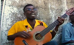 Video Finds: Brushy One-String Plays "Chicken in the Corn" on a One-String Guitar