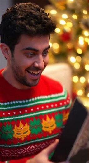 Ryan opens the Christmas present