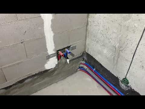 Plumbing installation in a new building. Manifold unit. Installation. Cross-linked polyethylene.