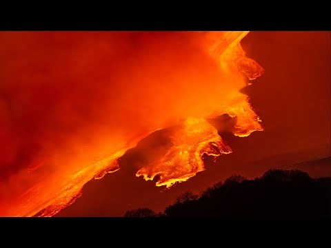 Spectacular footage of Mount Etna's mesmerising night-time eruption