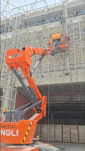 Boom Lift Façade Work in Progress | High-Rise Construction Safety & Precision