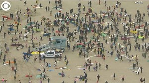 About 100 surfers gathered in Santa Monica, California on Friday for a "paddle-out" to honor George Floyd. | WNCT-TV