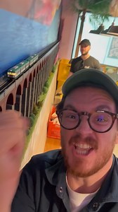 Soooo we’re opening near Euston station next week. Which gave us an idea. Can we install a fully working model train mural of the Amalfi coast in the pizzeria. Shout out to Jane’s Train of Tooting for helping bring the dream to life! Come down from 10th June to see the best crust dipper delivery system ever created 😂 #euston #eustonstation #modelrailway #modeltrain #modelrailwayscene #modelrailways #modeltrains | Pizza Pilgrims