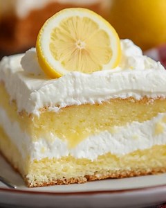 🍋❄️ Lemon Icebox Cake (Creamy, Cool & Sunshine-Bright) ❄️🍋 This is one of those desserts that feels like relief on a hot day. I remember icebox cakes like this waiting patiently in the fridge at summer gatherings , cool, creamy, and quietly stealing the show. That tangy lemon layer soaking into soft cake, topped with fluffy whipped cream… it’s simple comfort with a little sparkle. 📝 Ingredients: For the Cake 1 box yellow cake mix 1 small box instant lemon pudding mix 3/4 cup vegetable oil 3/4