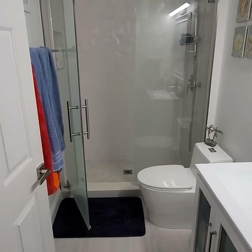 Modern Compact Bathroom Remodel | Frameless Glass Shower & Custom Tiles