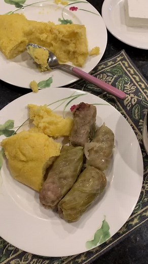 Delicious Plate of Fried Bread, Mashed Potatoes, and Cabbage Rolls