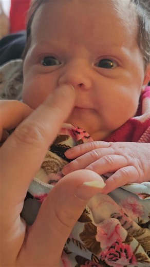 Finally caught a smile from her! 🤣🥰 (purely gas related I'm sure, but, still got it) 🤣 I cant believe shes already 3 weeks old! 😭 | Stevee Sierra