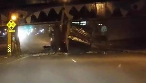 PRICELESS: We finally have live video of a truck getting eaten by the Maine Street Bridge. | Enid Buzz