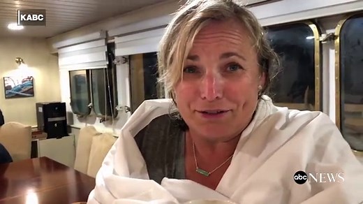 Boat catches fire forcing passengers into shark-infested waters