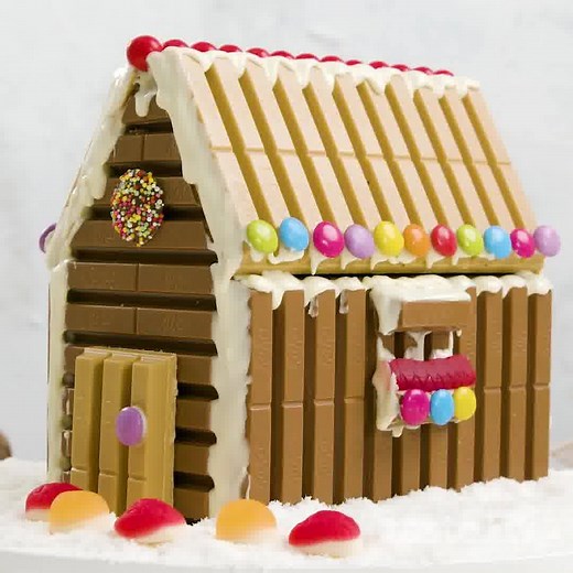 Step aside gingerbread. 😱 Get the recipe >>> https://www.taste.com.au/recipes/easy-kitkat-christmas-house-recipe/t4ys58c2 | Taste.com.au