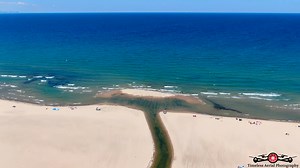 18K views · 313 reactions | Flying over the most southern tip of Lake Michigan. Lake Street Beach just got a new jet ski launch and mini island, while Marquette Park Beach is gearing up for the weekend! . . . . . . . . #drone #dronephotography #dronevideo #ScenicViews #WatchThis #facebookreels #timelessaerialphotography | Timeless Aerial Photography | Facebook