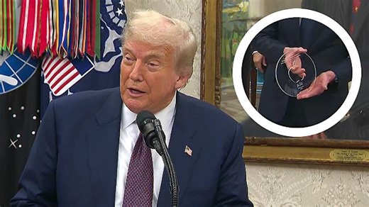 Apple's Tim Cook announces $100 billion in US investments, gives Trump expensive statue