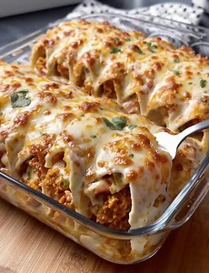 Cheesy Baked Chicken Tacos Crispy oven-baked tacos packed with juicy seasoned chicken, fresh veggies, and topped with layers of gooey melted cheese. Key Ingredients First: 2 cups cooked shredded chicken 1 tbsp olive oil 1 small onion, diced 2 cloves garlic, minced 1 (10 oz) can diced tomatoes with green chilies (drained) 1 packet taco seasoning (or homemade blend) ½ cup chicken broth 8–10 flour or corn tortillas 2 cups shredded Mexican blend cheese (or cheddar mozzarella mix) ½ cup red onion, di