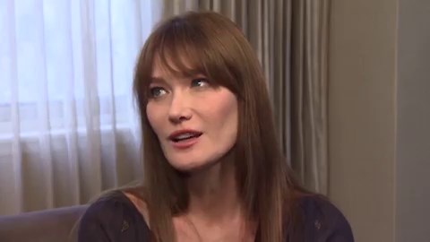 Carla Bruni takes spotlight in stride