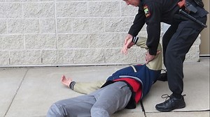 Defensive tactics training: How to get a suspect from his back to his stomach