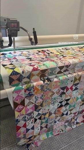 on the long arm • hourglass scrap quilt • flannel backing • edge to edge quilting “flying geese”