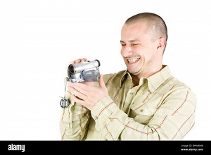 Man using video camera (camcorder), isolated on white background Stock Photo - Alamy