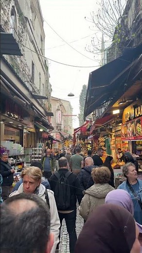Busy Market Street in Istanbul's Grand Bazaar, Capturing the Bustling Atmosphere of Traditional