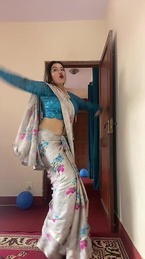 Traditional Saree Dance Performance with Floral Elegance