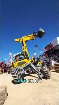 This Excavator Walks Over Mountains and Through Rivers