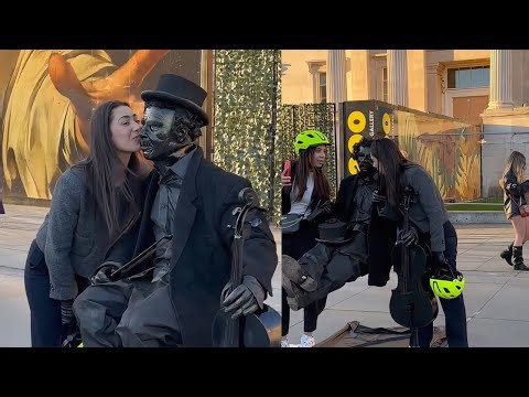 How the Levitating Cello-man Statue is approached by girls! #livingstatue #floating #art