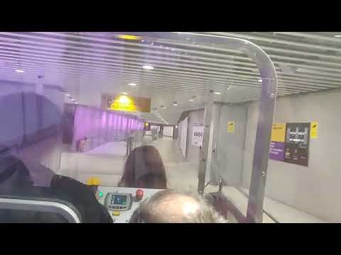 Heathrow Terminal 5: A drive through the pedestrian tunnel in an assistance buggy