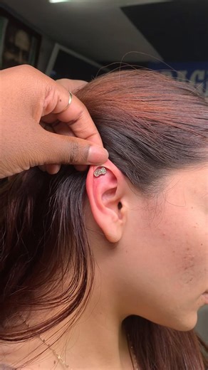 Cute bow piercing 😍🎀 #fyp #piercings #foryoupage #piercing #earpiercing