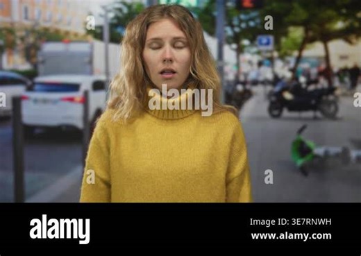 Woman face surprised street blonde young turtleneck city urban outdoors Stock Video Footage - Alamy