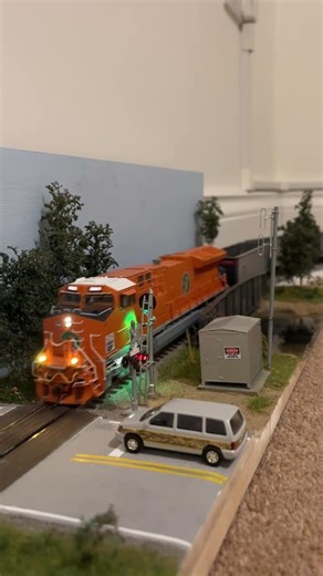 Scaletrains ET44AC with short coal train