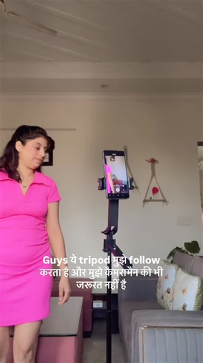 Ishika S Singh on Instagram: "Finally found a cameraman who never gets tired, never complains, and follows me everywhere 😂🎥 This smart face tracking tripod rotates 360° and automatically follows my face wherever I move — left, right, even while walking! Perfect for vlogging, reels, outfit shots, dance videos, or even cooking videos at home 💃🍳 And wait… it also comes with a cute little Bluetooth remote so I can click photos and start videos without even touching my phone 📸✨ PLUS it has dual 