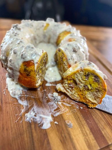 167K views · 842 reactions | Breakfast bundt bake casserole! CJ shows you how to make this amazing breakfast bundt bake casserole. This will be the hit of any breakfast or brunch. Using biscuits, eggs, sausage, cheese, bacon and topped with gravy, this dish will make you the star of brunch! What would you add to this casserole? #breakfastcasserole #brunchideas #breakfastideas | Cooking with CJ | Facebook