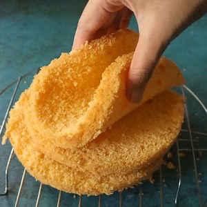 2.5K views · 23 reactions | Cotton Soft Orange Cake | Basic Sponge Cake Recipe | How To Make Orange Cake | Easy Sponge Cake YouTube: https://youtu.be/6EG6QpV2vhI | Cooking Fusion | Facebook