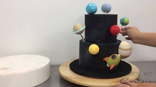 10K views · 209 reactions | A preview of how this space cake came together. You can watch the full tutorial on my YouTube channel here - https://youtu.be/VHEKXDkVKpg | Sharon Wee Creations | Facebook