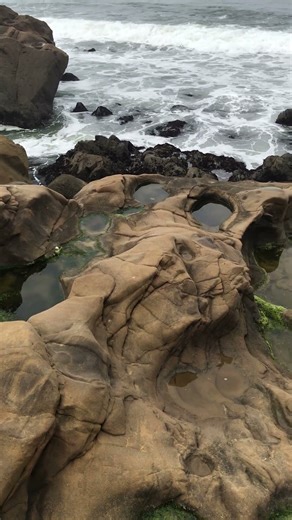 Ruins of Native American Spring cascading into the ocean