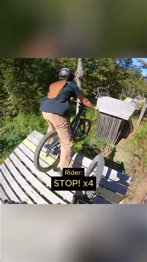 Mountain Biker Falls Off Ramp!