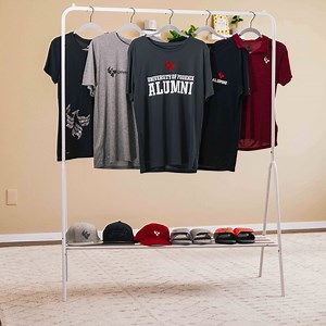 Give your closet a little #UOPXPride with our latest swag drop now available at http://uof.ph/6181H4eDP. What are some of your favorite new items, and why is it the doggy tee? 🐾🎓 | University of Phoenix Alumni Association