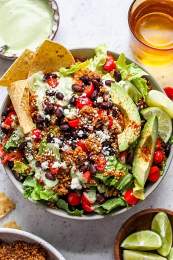 Quinoa Taco Salad with Baja-inspired Dressing https://dishingouthealth.com/30-minute-loaded-quinoa-taco-salad/ | Dishing Out Health