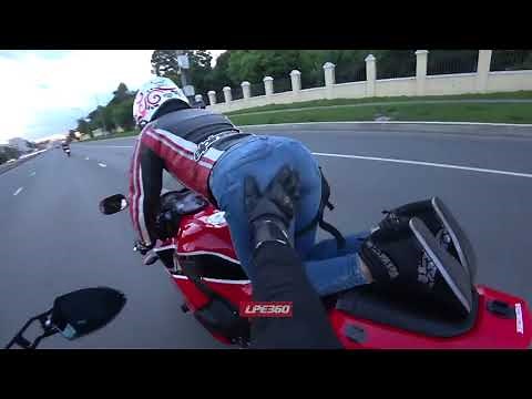 Motorcyclist Slaps a Girl's Butt