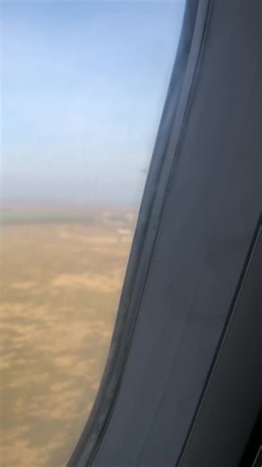 Airplane Landing View from the Window