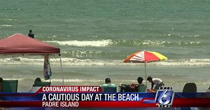 Beach goers cautiously have fun in the sun this Labor Day