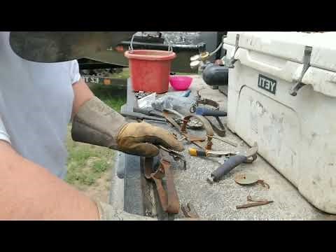 Modifying longspring traps for coyote,bobcat an beaver