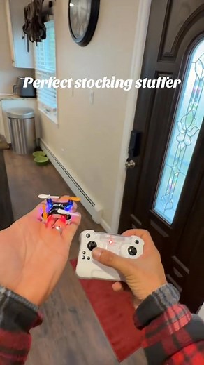 This little drone is insane — it literally stores inside its own remote 勞 Perfect for travel, super easy to fly, does flips, has lights, and recharges fast with USB-C. The ultimate pocket-sized gift for anyone who loves fun tech! #MiniDrone #GadgetTok #GiftIdeas #CreatorPicks #holidayfinds | Resolutionp. | Facebook